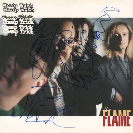 Lot #413 Cheap Trick Signed 45 RPM Record Sleeve - The Flame - Image 1