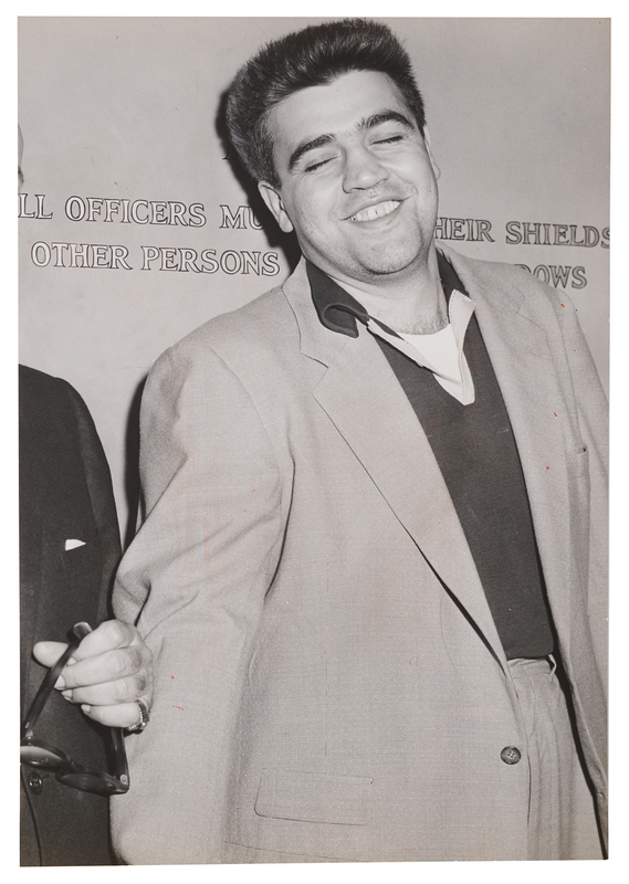 Lot 458 Vincent 'The Chin' Gigante Oversized 1957 Press Photo, Following His Arrest for the Attempted Murder of Frank Costello