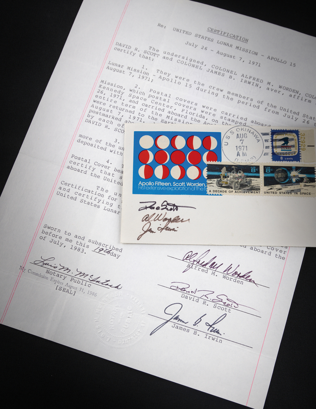 Lot 6267 Apollo 15 Flown 'Phases of the Moon' Cover with Crew-Signed Certificate