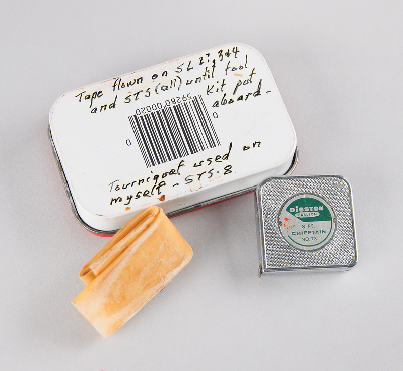 Lot 6368 Skylab and Space Shuttle Measuring Tape and Tourniquet [Attested Flown] - From the Personal Collection of William E. Thornton