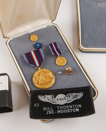Lot #6407 NASA Space Flight Medal, Name Tag,