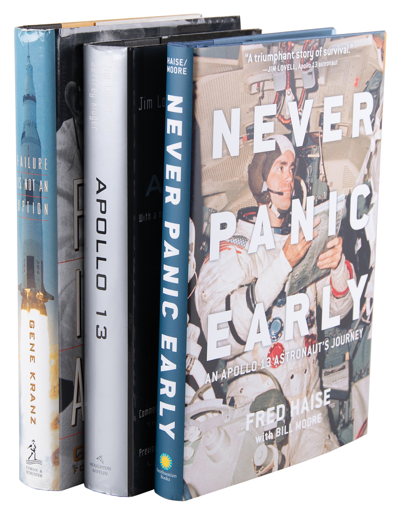 Lot 482 Apollo 13 (3) Signed Books, with Lovell, Haise, and Kranz