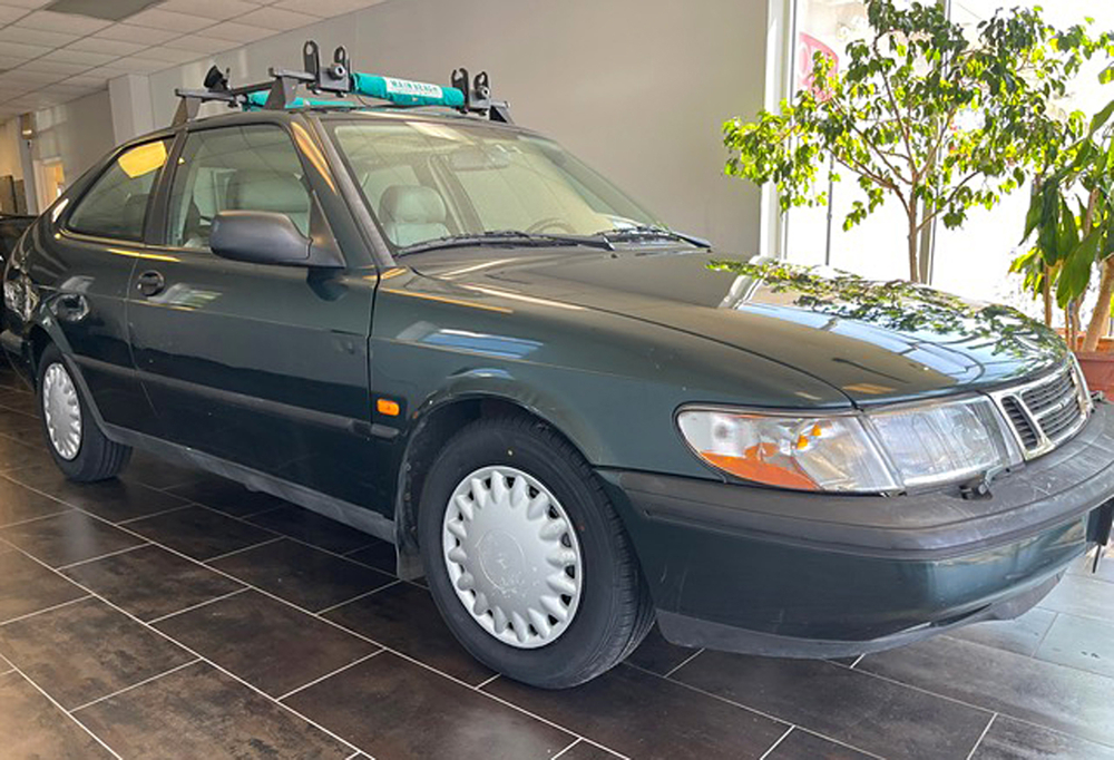 Lot 295 John F. Kennedy, Jr.’s Personally Owned 1994 Saab 900 SE Coupe - His Widely Photographed Last Car and a Fixture of His Life in 1990s New York