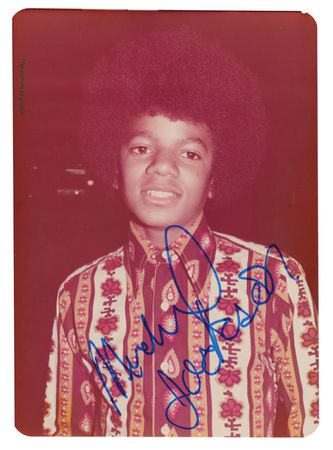 Lot #693. Michael Jackson Early Signed Candid Photograph