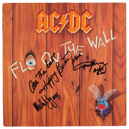Lot #615 AC/DC Signed Album - Fly on the Wall