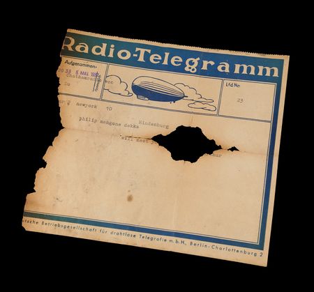 Lot #7015 Hindenburg Disaster: Original Ticket, Radiogram, Wine Menu, and Zeppelin China Fragment Recovered from Wreckage - Image 4
